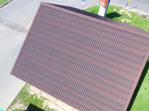 Фото крыши из коричневого ондулина черепица